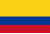 The flag of Colombia features three horizontal bands of yellow (top, double-width), blue, and red; the yellow band bears a depiction of a condor perched on a Colombian heraldic device representing the Andes mountain range and below the device, a stylized depiction of ships sailing near a mountain peak in blue.