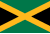 The flag of Jamaica features a gold saltire that divides the flag into four sections: two of them are green (top and bottom) and two are black (hoist and fly); centered in the saltire is a yellow disk bearing a black-colored depiction of a bird, the yellow cross symbolizes hope, the green symbolizes agricultural wealth, and the black represents hardships overcome and to be faced.